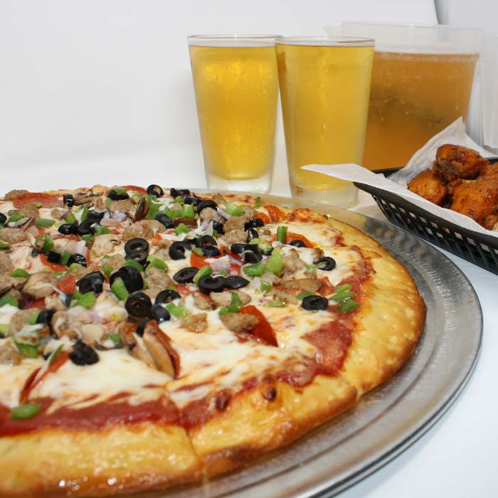FUBAR Pizza Bar restaurant pizzeria in Fort Walton Beach, Florida waterfront supreme pizza, basket of chicken wings and ice cold tap beer FUBAR Pizza Bar restaurant pizzeria in Fort Walton Beach, Florida waterfront supreme pizza, basket of chicken wings and ice cold tap beer